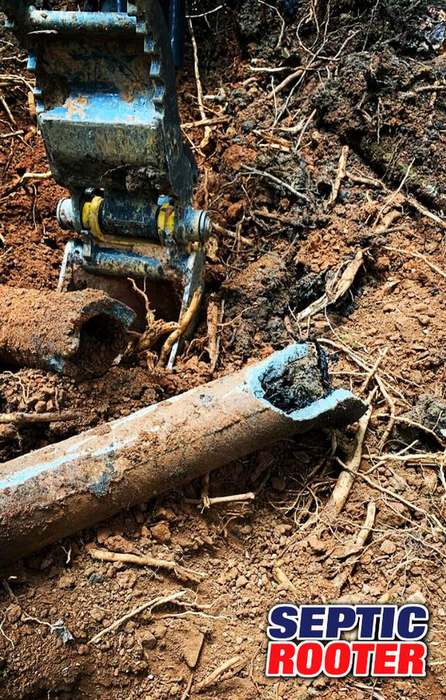 Failed corroded septic pipe repaired by SepticRooter™ in Covington, GA — licensed septic contractor